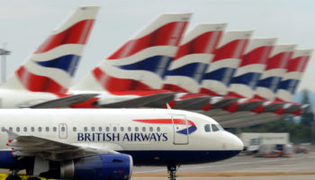 A British Airways aircraft taxis past ot